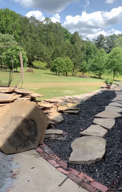 laid the stone out for the cottage style stone path 