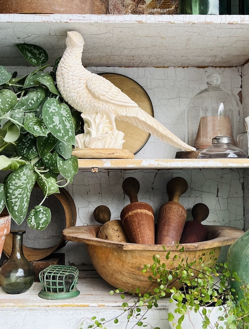 shelf styling with the cutest pheasant