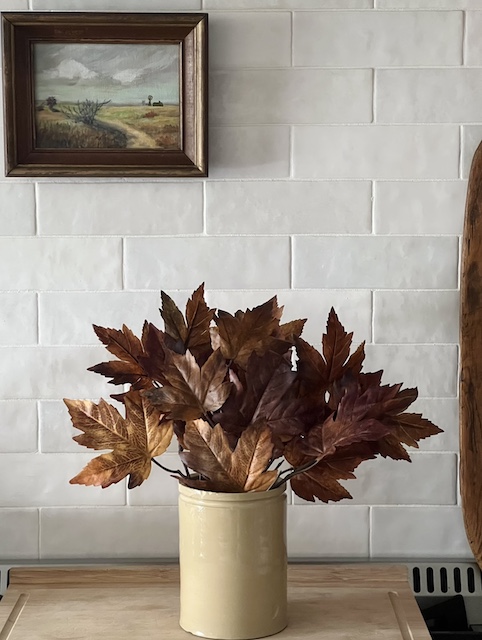 a little vignette of brown faux fall brnaches